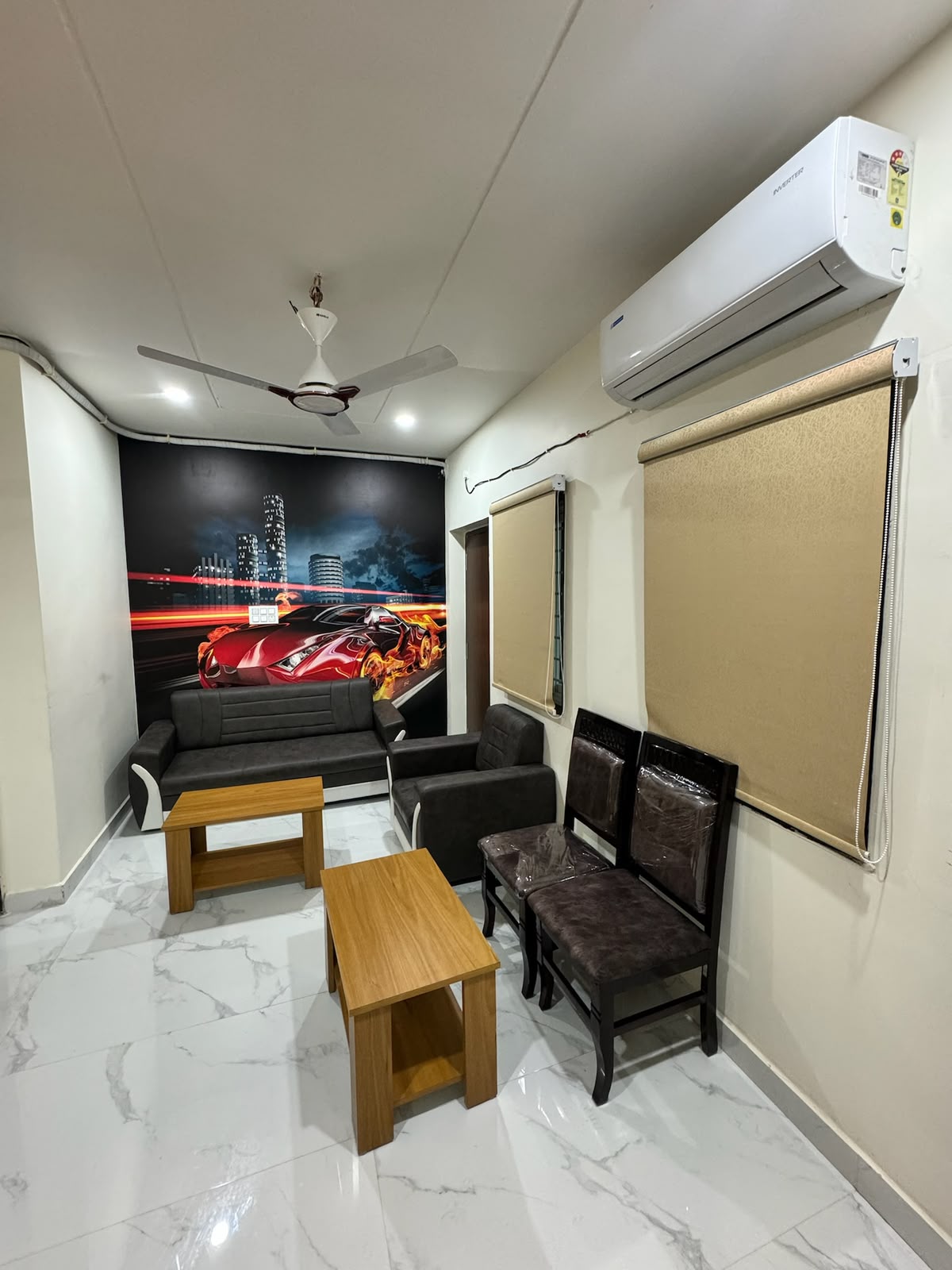 Lounge seating area at Hotel Dharani Grand Khammam